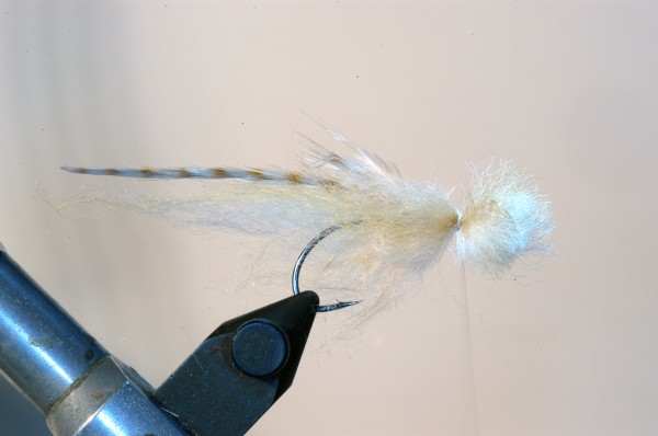 9.) Tie in the bunches on the sides – again tips backwards and reaching app to the hook bend