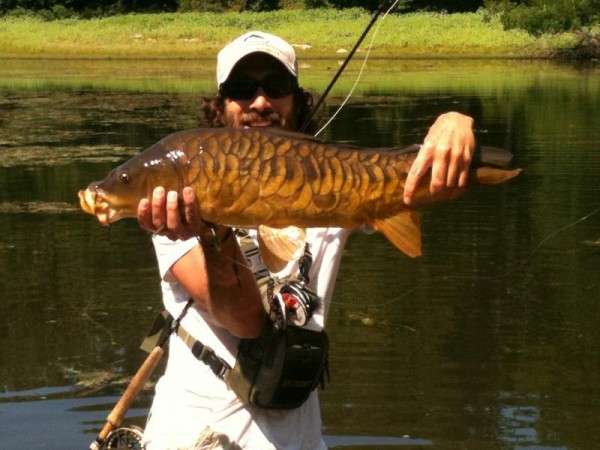 Capt. Vincent Catalano with a nice mirror carp.