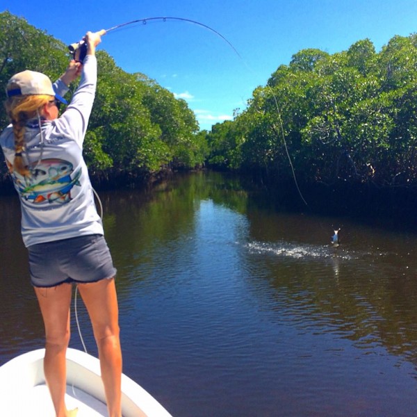 Dancing with a baby tarpon in her beloved Everglades.