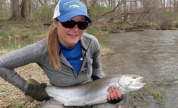 Scrapping out a nice steelhead on a tough day...