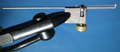 HMH tube fly tool adapter allows you to  use your conventional vise, around $30.