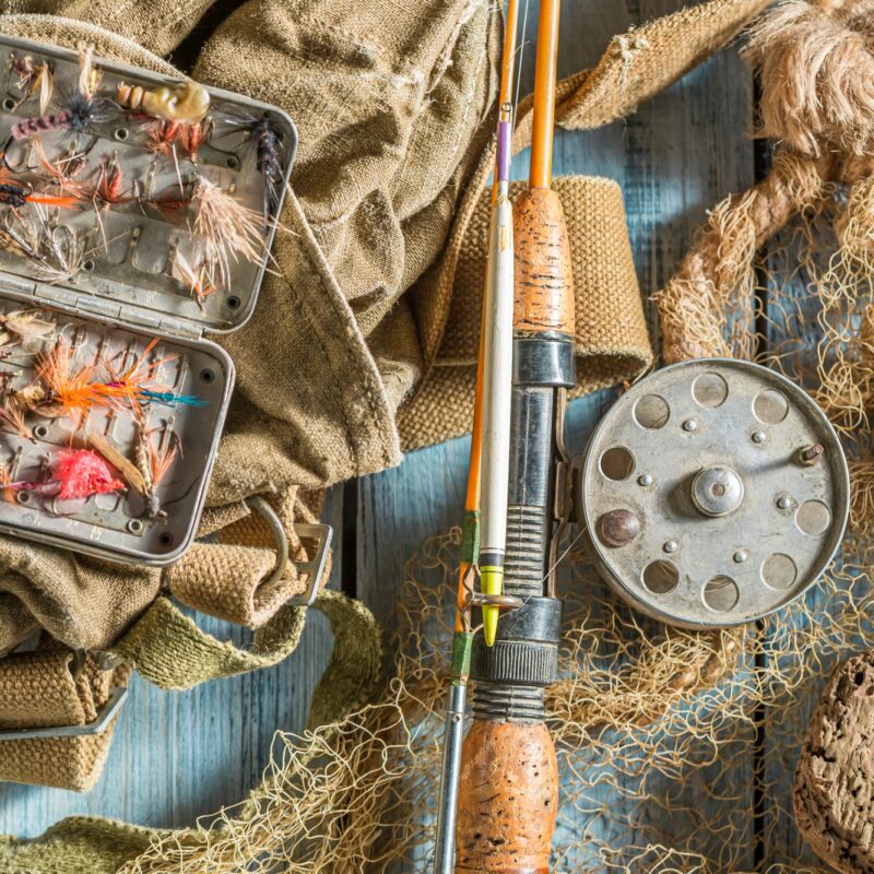 Handmade fishing equipment with rod and lures. Fishing preparation